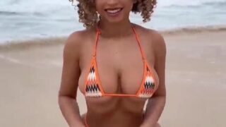 Kiara Peach  video shows off her big boobs on the beach!